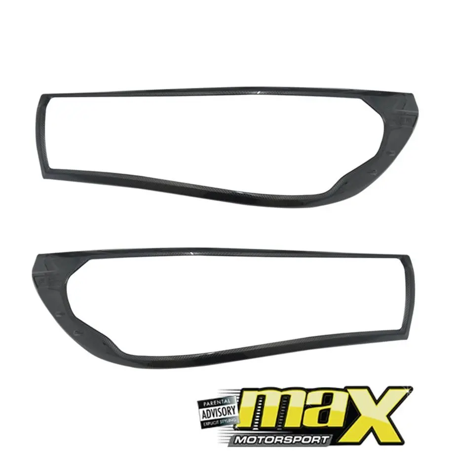 Toyota Hilux Revo (15-On) Carbon Fibre Headlight Surround 1